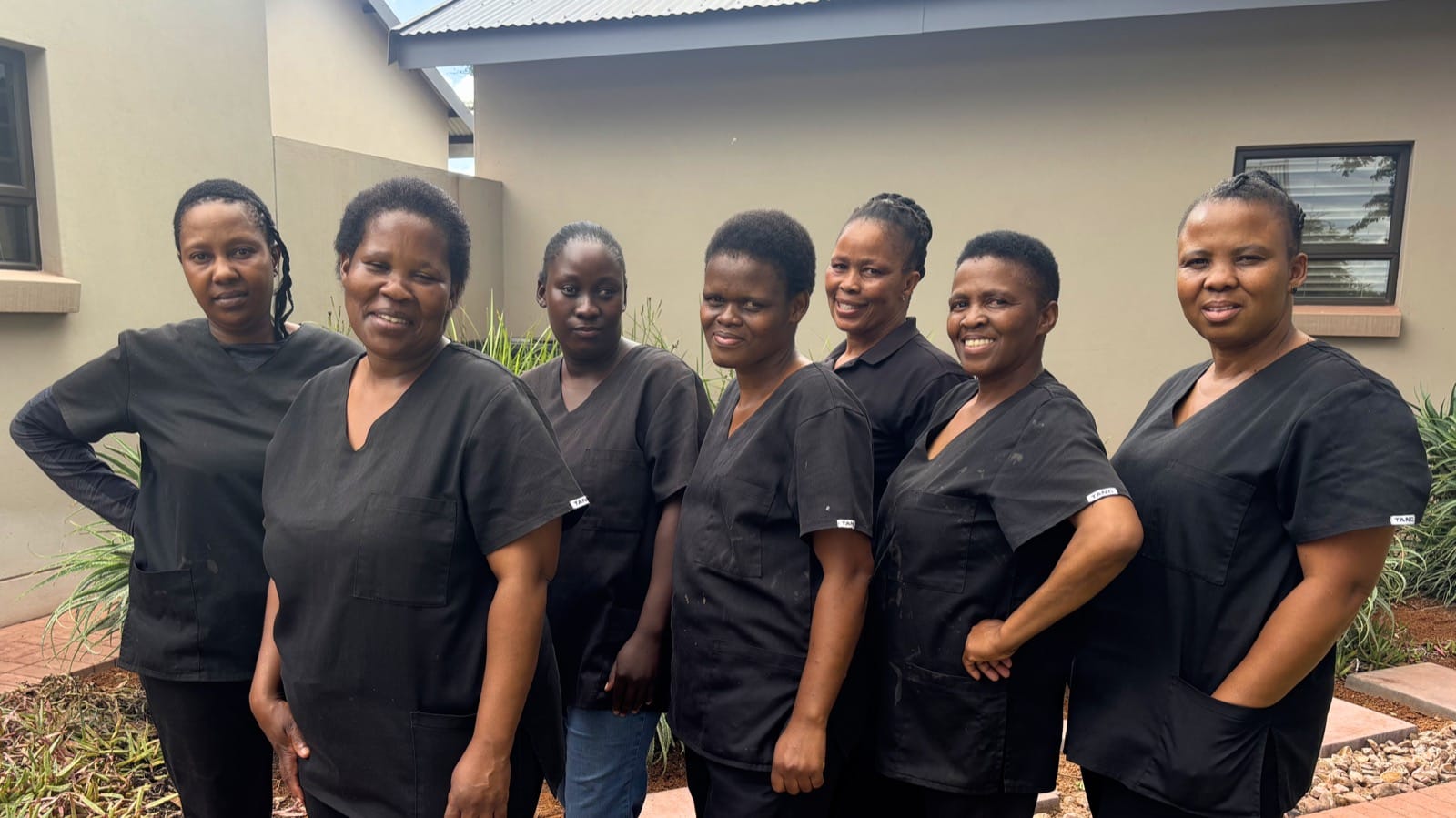 Spotless Cleaning Services team assembled for a group photo